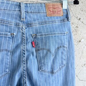 Levi's Women's Light Blue Pinstripe Skinny Jeans with Red Tab